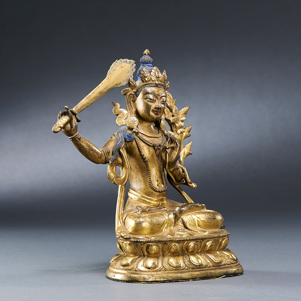 TIBETO-CHINESE, QING DYNASTY (1644-1911) A GILT-BRONZE SEATED FIGURE OF MANJUSRI BODHISATTVA H 17. - Image 2 of 6