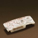 HAN DYNASTY (206 BC-AD 220) AN UNEARTHED WHITE JADE DRAGON SWORD SLIDE L 6.5 cm. (2 1/2 in.)  漢