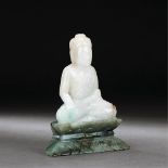 CHINA, QING DYNASTY (1644-1911) A JADEITE SEATED FIGURE OF SHAKYAMUNI WITH JADEITE STAND Figure: H
