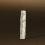 LIANGZHU CULTURE (CIRCA 3400-2250 BC) AN UNEARTHED JADE TRIANGULAR-PRISM TUBE L 7.5 cm. (3 in.) 良渚文化