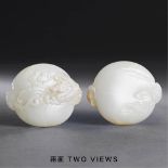 QING DYNASTY (1644-1911) A WHITE JADE DRAGON PAPER WEIGHT L 6.1 cm. (2 3/8 in.) 清 白玉「旭日東升」雲龍紋紙鎮