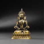 TIBETO-CHINESE, EARLY QING PERIOD A GILT-BRONZE FIGURE OF AMITAYUS H 20 cm. (7 7/8 in. )