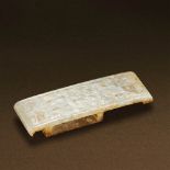 HAN DYNASTY (206 BC-AD 220) AN UNEARTHED WHITE JADE ARCHAIC SWORD SLIDE L 8.2 cm. (3 1/4 in.) 漢