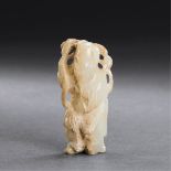 QING DYNASTY (1644-1911) AN UNEARTHED WHITE JADE FIGURE OF SHOULAO H 5.1 cm. (2 in.) 清 生坑白玉壽老