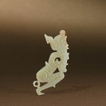 WESTERN ZHOU (CIRCA 1100-771 BC) A WHITE JADE PENDANT L 4.9 cm. (2 in.) T 0.3 cm. Reference: A