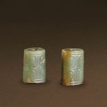 WESTERN ZHOU (CIRCA 1100-771 BC) A PAIR OF YELLOW JADE TUBES, LEZI The largest：L 2.7 cm. (1 in.)