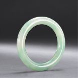 A JADEITE BANGLE Outer diameter, inner diameter and thickness approximately 78.58, 55.85 and 11.