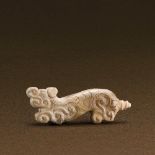 SPRING AND AUTUMN PERIOD (770-476 BC) A JADE 'TIGER' PENDANT L 3.8 cm. (1 1/2 in.) Reference: A