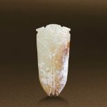 HAN DYNASTY (206 BC-AD 220) AN UNEARTHED WHITE JADE CICADA  L 6 cm. (2 3/8 in.)  漢 生坑白玉蟬