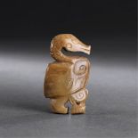 SHANG AND ZHOU PERIOD A CARVED JADE OF A GOOSE L 5.3 cm. (2 in.) Reference: A similar jade carving