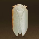 HAN DYNASTY (206 BC-AD 220) AN UNEARTHED WHITE JADE CICADA  L 6.4 cm. (2 1/2 in.) 漢 生坑白玉蟬