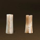 WESTERN ZHOU (CIRCA 1100-771 BC) A PAIR OF UNEARTHED WHITE JADE PENDANTS, LEZI The largest：L 5.2 cm.