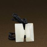 HAN DYNASTY (206 BC-AD 220) A FINE WHITE JADE PENDANT L 2.3 cm. (3/4 in.) T 0.6 cm. 漢 白玉工字珮