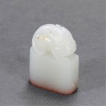 QING DYNASTY (1644-1911) A WHITE JADE BEAST SEAL The seal face carved with the two characters jin