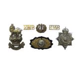 Selection of Royal Marine Badges including brass Royal Marine Band ... KC silver RM ... KC brass