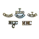 Good Selection of Brass Shoulder Titles consisting MMG ... B NFA ... MGC C (cast) ... T Highland