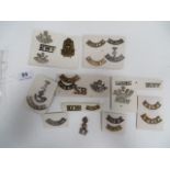 Selection of Shoulder Titles white metal include Cornwall with bugle ... T 7 Middlesex ...