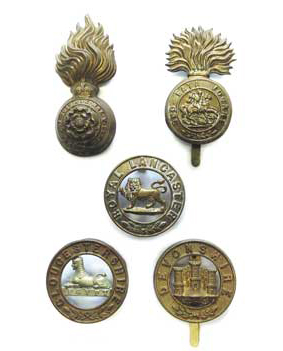 Small Selection of Various Badges consisting brass Royal Lancaster OR’s helmet plate centre (4