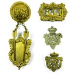 Selection of Shoulder Belt Fittings including gilt lion mask, double arrow prickers and scroll