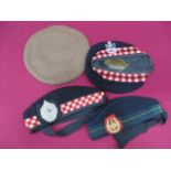 Small Selection of British Hats consisting black glengarry with lower tartan band and brass Gordon