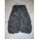 Royal Horse Guards Officer’s Sheepskin Saddle Cloth black sheepskin shaped cloth. The sides with two
