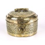 A brass Afghan spice container 19th century, of short cylindrical form, domed hinged lid with shaped