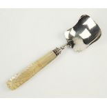 A George IV silver caddy spoon, Unite & Hilliard, Birmingham 1831, mother of pearl handle with cross