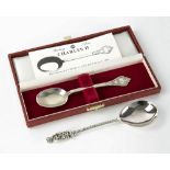 Two reproductions of 17th century silver spoons, comprising a Charles II style lace back trefid
