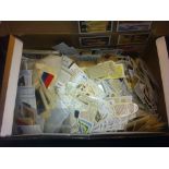 Shoe box of cigarette cards loose and in