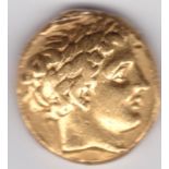 Solid Gold ancient Greek coin. dating from King Philip II who was the father of Alexanda the Great