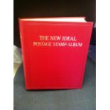 STAMP ALBUM : New Ideal album in original box & in superb condition with a splattering of stamps.