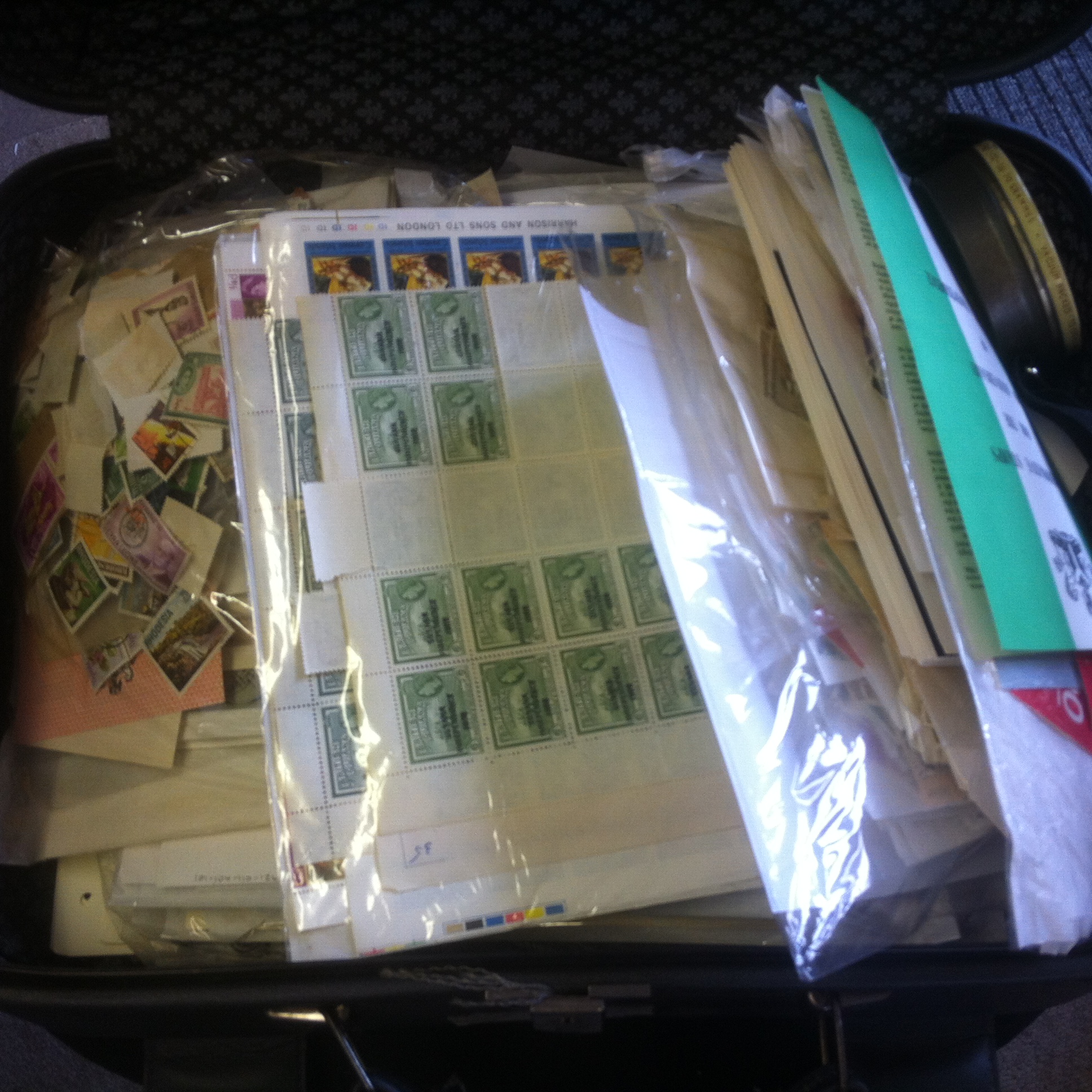 STAMPS : The Suitcase makes a return ! mostly commonwealth on pages, in packets, etc.