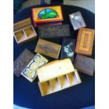 Stamp boxes, an accumulation of various small wooden stamp boxes, various designs.