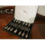 Antique Cased Set of Twelve Solid Silver Tea Spoons with Solid Silver Sugar Nips and Scoop