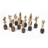A BAND OF TWELVE IVORY MUSICIANS, GERMAN, LATE 19TH CENTURY the conductor holding up his music and