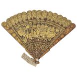 A CHINESE GILT LACQUER FAN, MID-19TH CENTURY the sticks painted with figural scenes on the river