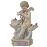 A MEISSEN FIGURE OF CUPID, LATE 19TH CENTURY after the model by Acier of Cupid seated on a cloud