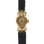 LADY'S GOLD WATCH, REGLIA, 1950s the circular ivory dial with hands and Arabic numerals behind