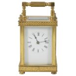 A FRENCH GILT-BRASS CARRIAGE CLOCK, LATE 19TH CENTURY gong striking movement, white dial with