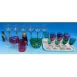 A selection of coloured and other glassware including 3 cranberry wines, 8 green bowl glasses; a