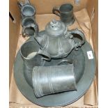 Two 19th century pewter chargers; 5 pewter tankards and an old teapot