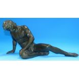 A bronze figure "The Dying Gaul", after the classical original, length 17"