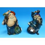 A pair of Chinese glazed porcelain figures, seal marks to base, 6½"