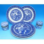 Two blue and white china covered jars; 4 Willow pattern plates