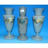 A Victorian matched garniture of 3 celadon opaque glass vases with polychrome floral decoration