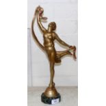 An Art Deco/Nouveau spelter figure of a dancing lady, on marble base, signed P Saga