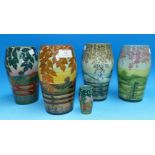 Four tube lined vases in the Moorcroft style, by Dennis China Works "Holden Wood", signed 'S Tides';