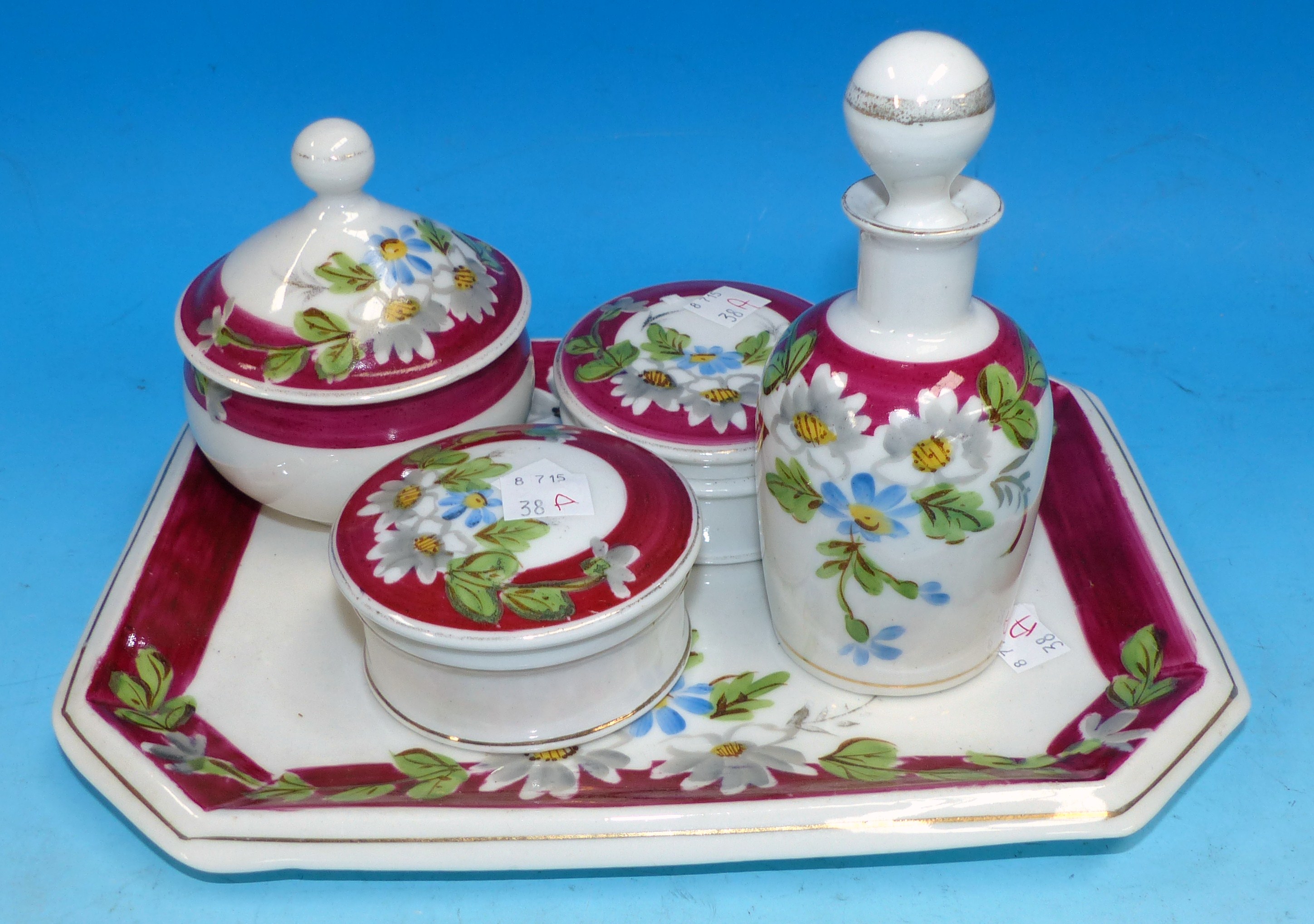 A Victorian porcelain 5 piece dressing table set