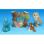 A Beswick owl; a pair of Beswick dogs; a Hornsea group with fawn; etc.