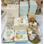 A collection of cherished teddies, mostly boxed